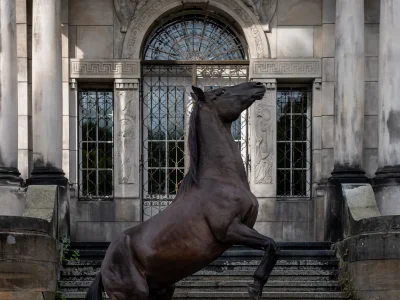 Black horse statue steps